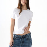 Person wearing a white t-shirt and blue jeans on a white background