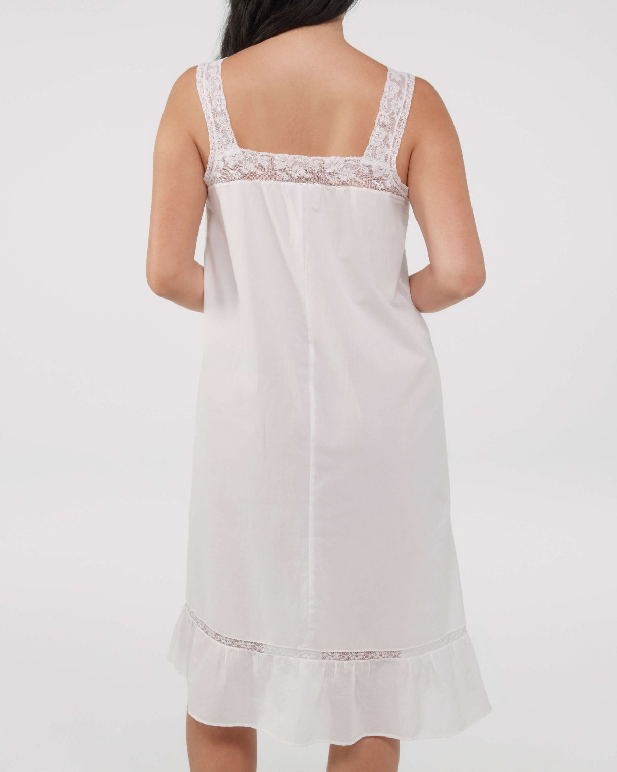 White lace-trimmed nightgown on a white background