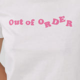 White t-shirt with pink text 'Out of Order' 