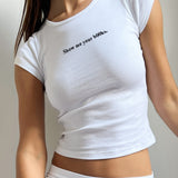 The Books Baby Tee: White Cotton Jersey