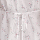Floral-patterned fabric with a white drawstring on a light background
