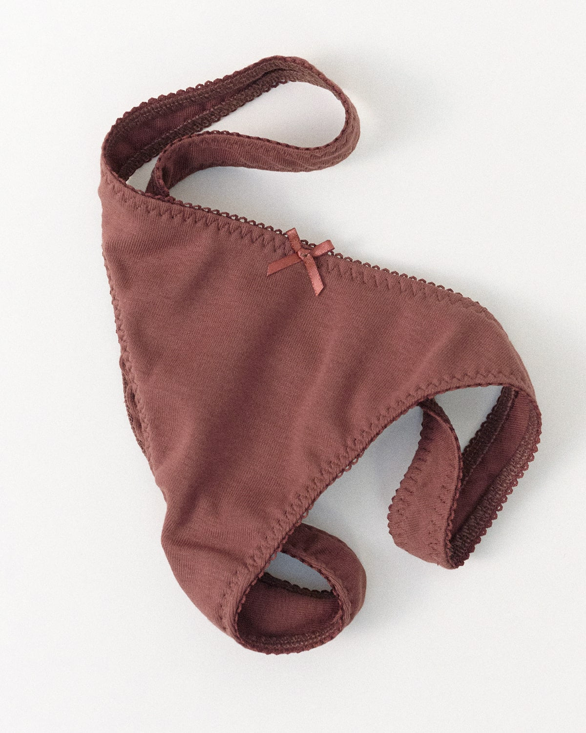 Brown thong a white background
